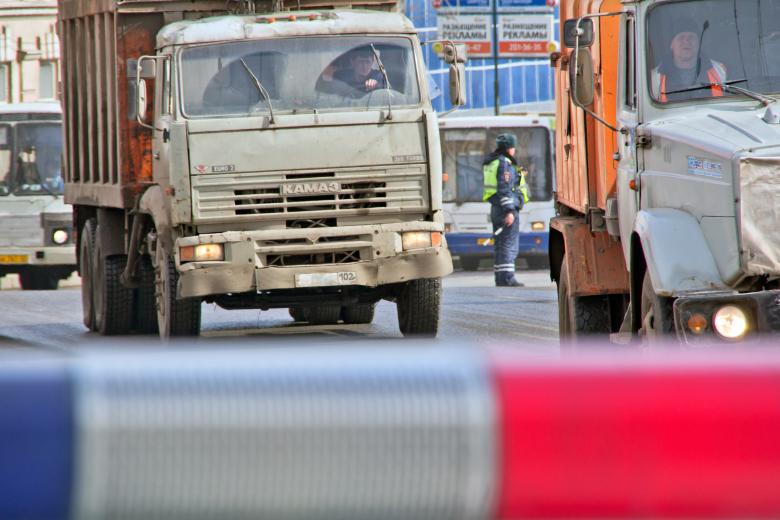 Free stock image of Officer between trucks created by 2happy
