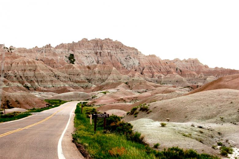 Free stock image of Road through the Desert Badlands created by Chance Buell