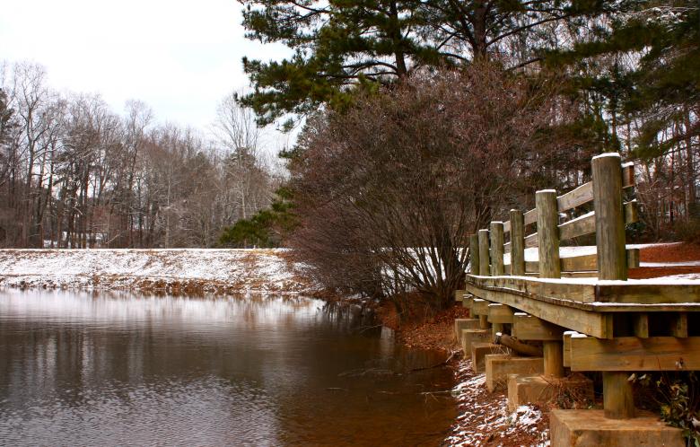 Free stock image of A snow covered dock by a lake created by Benjamin Miller