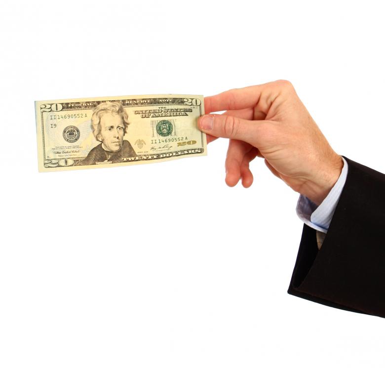 Free stock image of A hand holding a twenty dollar bill created by Benjamin Miller