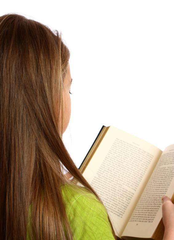 Free stock image of A beautiful young girl reading a book created by Benjamin Miller