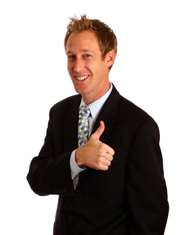 Free stock image of A young businessman giving a thumbs up created by Benjamin Miller