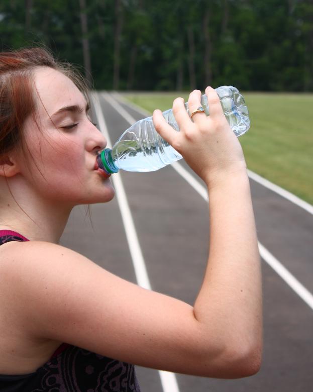 Free stock image of A cute young girl drinking water created by Benjamin Miller