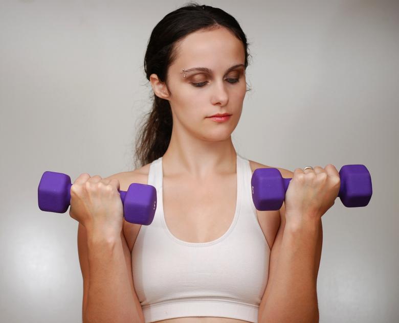 Free stock image of A beautiful young woman exercising created by Benjamin Miller