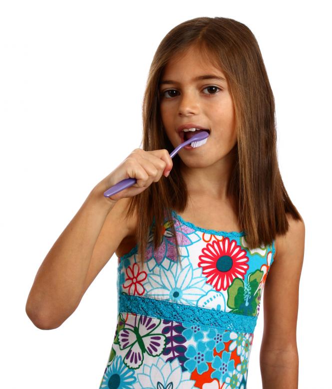 Free stock image of A pretty young girl brushing her teeth created by Benjamin Miller