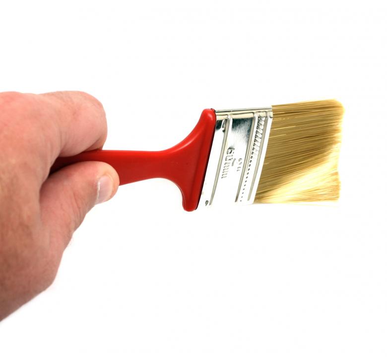 Free stock image of A hand holding a paint brush created by Benjamin Miller