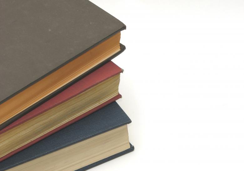 Free stock image of A stack of books isolated on white created by Benjamin Miller