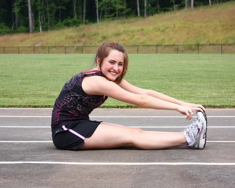 Free stock image of A cute young girl doing stretches created by Benjamin Miller