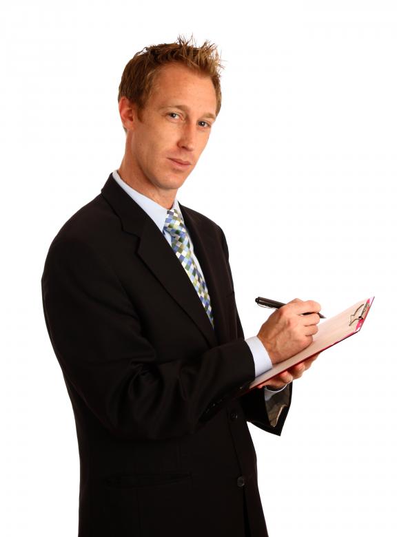Free stock image of A young businessman holding a clipboard  created by Benjamin Miller