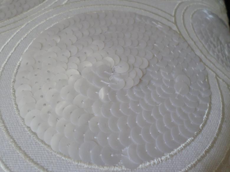 Free stock image of White sequins on fabric created by Mark Gleeson