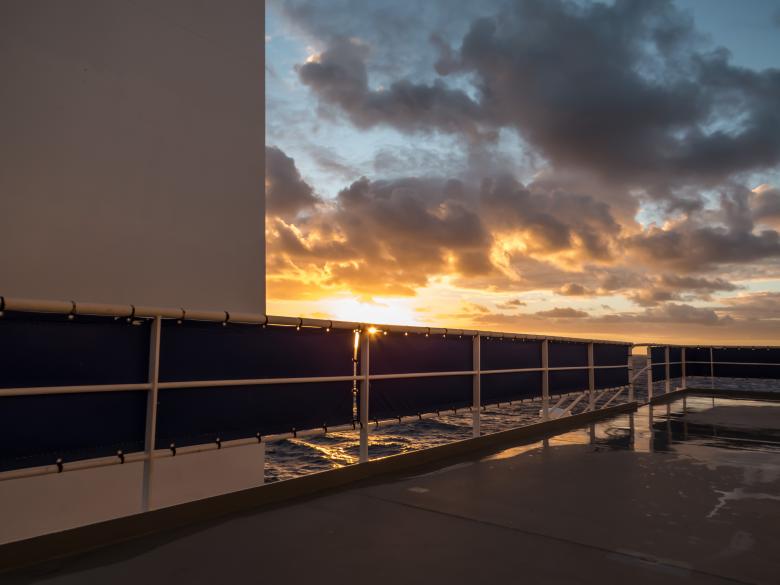 Free stock image of A view to the sunset from ship's deck created by Janis Urtans