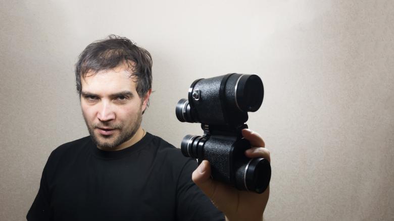Free stock image of young man with binoculars created by Mudretsov Olexandr