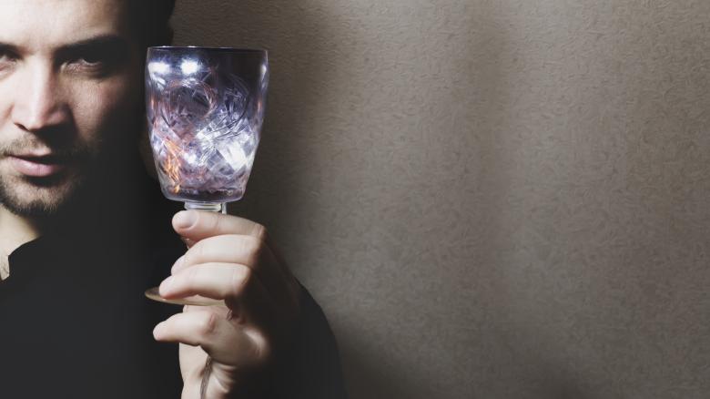 Free stock image of Man holding wine glass created by Mudretsov Olexandr