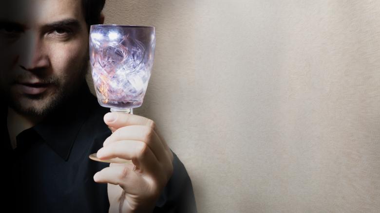 Free stock image of Man holding wine glass created by Mudretsov Olexandr