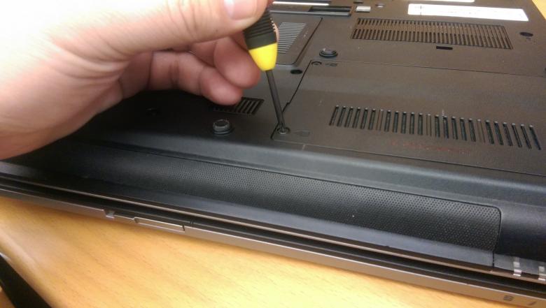 Free stock image of Hand holding a laptop screwdriver created by Jared Davidson