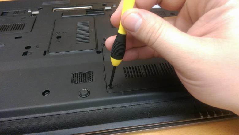 Free stock image of Hand holding a laptop screwdriver created by Jared Davidson