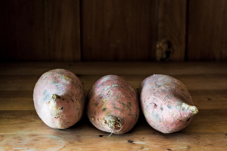 Free stock image of Sweet potatoes on wooden background created by Luka
