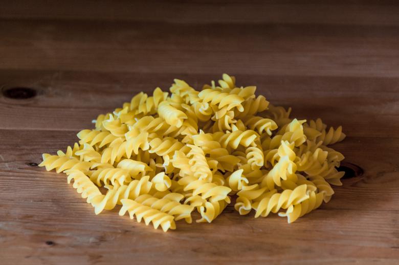 Free stock image of Fusilli pasta on a old wooden background created by Luka