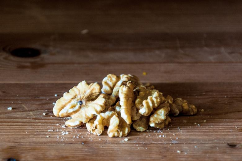 Free stock image of Walnuts on wooden table created by Luka