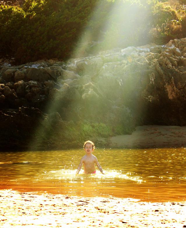 Free stock image of Child hit by sun rays bathing created by Jack Moreh