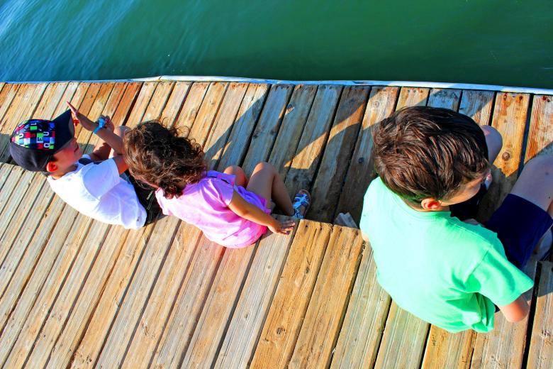 Free stock image of Kids talking on the pier created by Jack Moreh