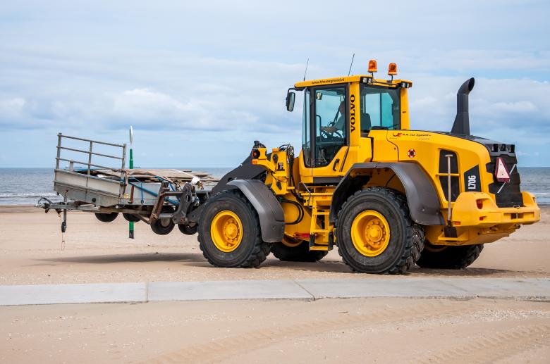 Free stock image of Bulldozer tractor working on a beach created by Luka