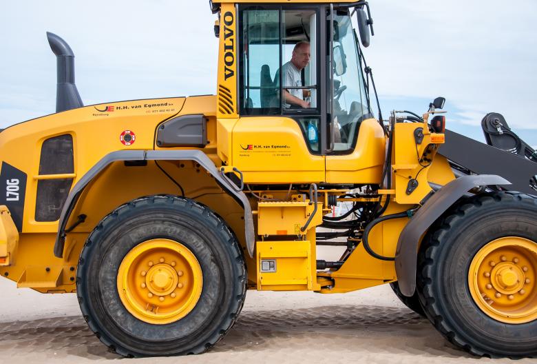 Free stock image of Bulldozer tractor working on a beach created by Luka