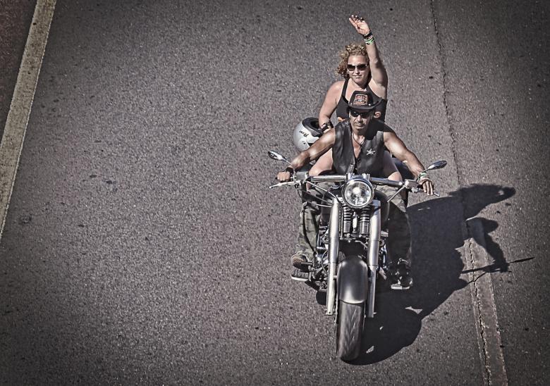 Free stock image of Biker waving on a chopper bike created by Jack Moreh