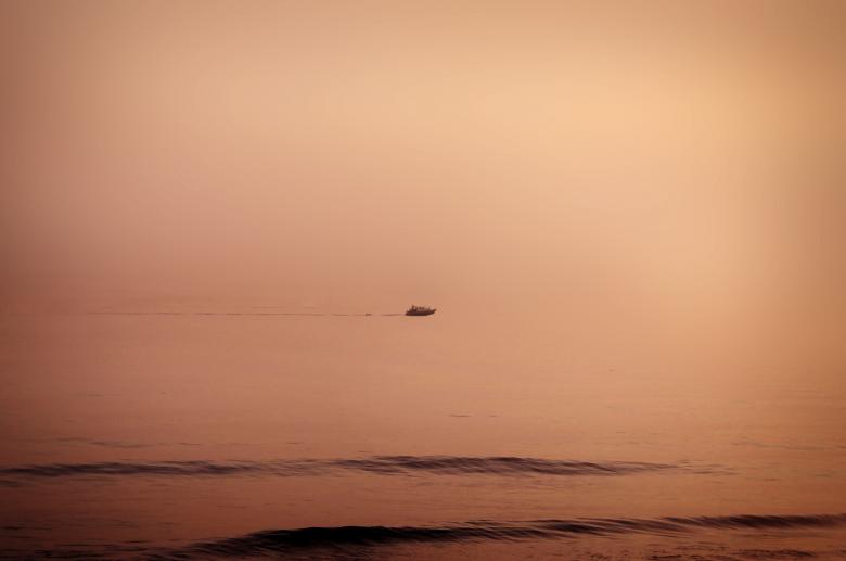 Free stock image of Floating - A lonely distant boat cruisin created by Jack Moreh