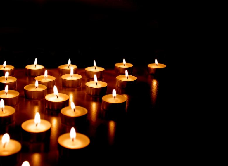 Free stock image of Burning candles on black background created by Jack Moreh