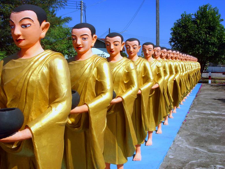 Free stock image of Line of Buddhist monk statues created by Chas Mac