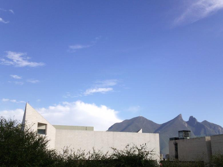 Free stock image of Buildings and mountains created by MAKAKIKUS