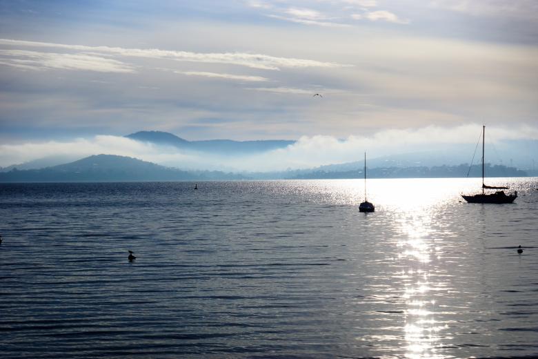 Free stock image of Cloudy Mountains and Still Ocean created by Life of Pix