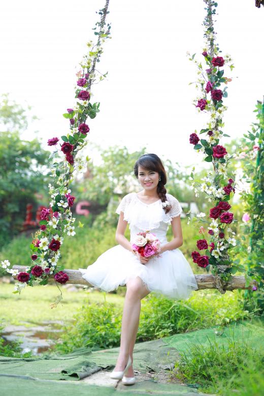 Free stock image of Wife on a swing created by Nga Le