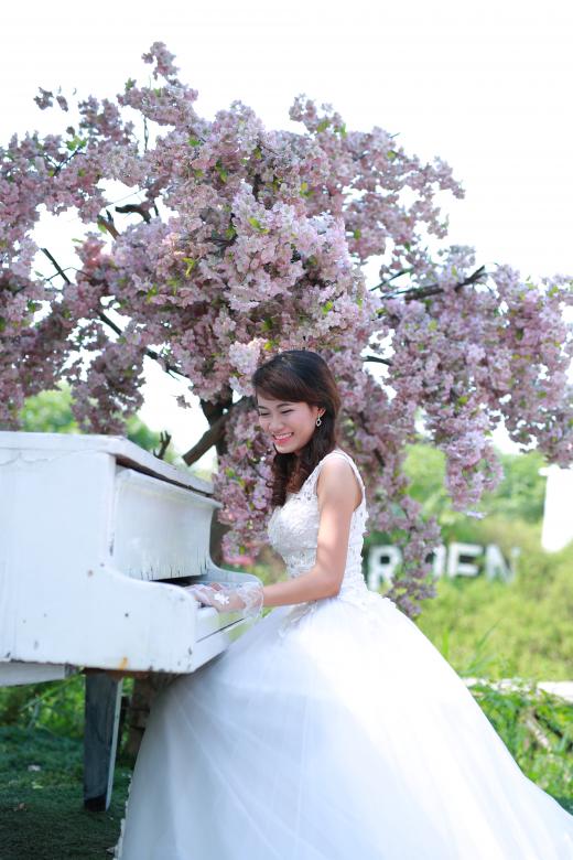 Free stock image of Bride playing the piano created by Nga Le