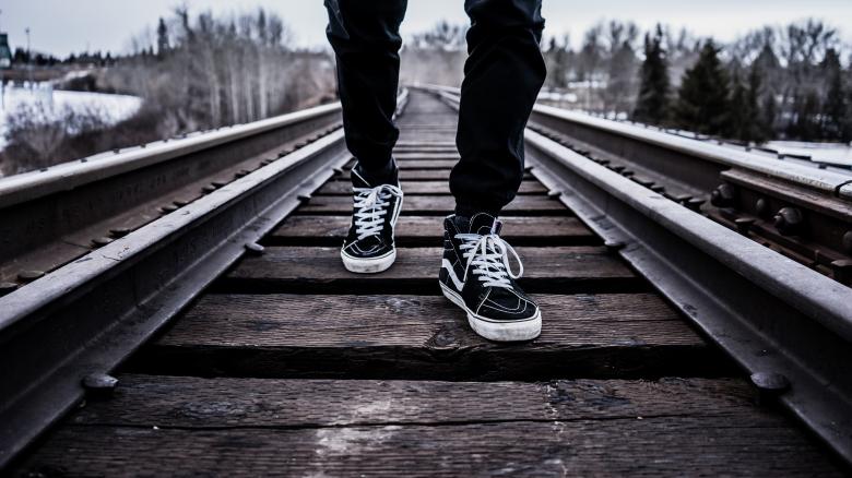 Free stock image of Walking On The Rail created by StockSnap