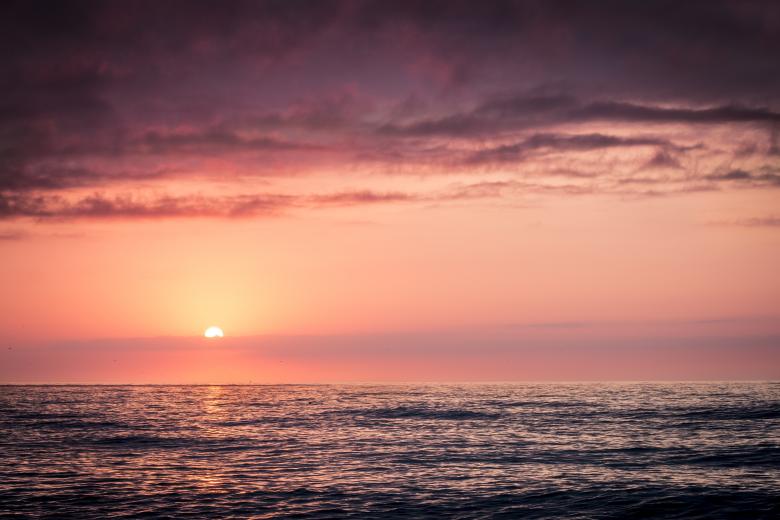 Free stock image of Sunset over the Ocean created by Pixabay