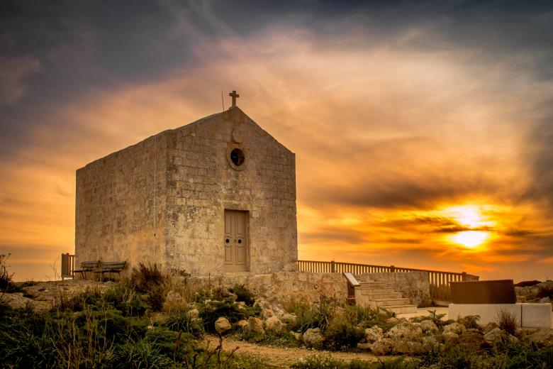 Free stock image of Sunset behind an old church created by Pixabay