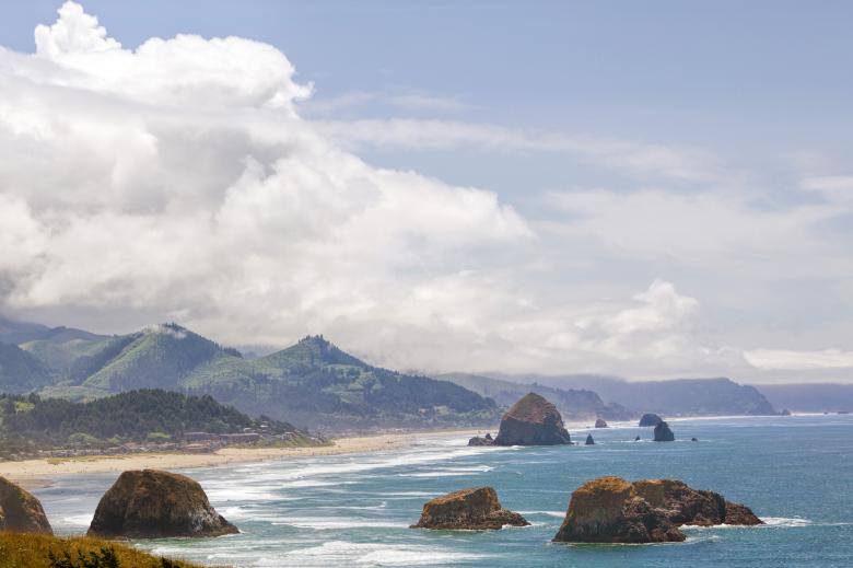 Free stock image of Haystack Rock created by Geoffrey Whiteway