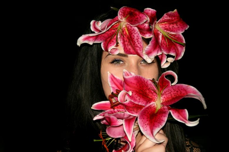 Free stock image of Girl holding Flowers created by Pixabay