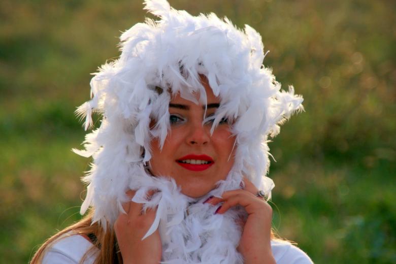 Free stock image of White Feathers Woman Portrait created by Pixabay
