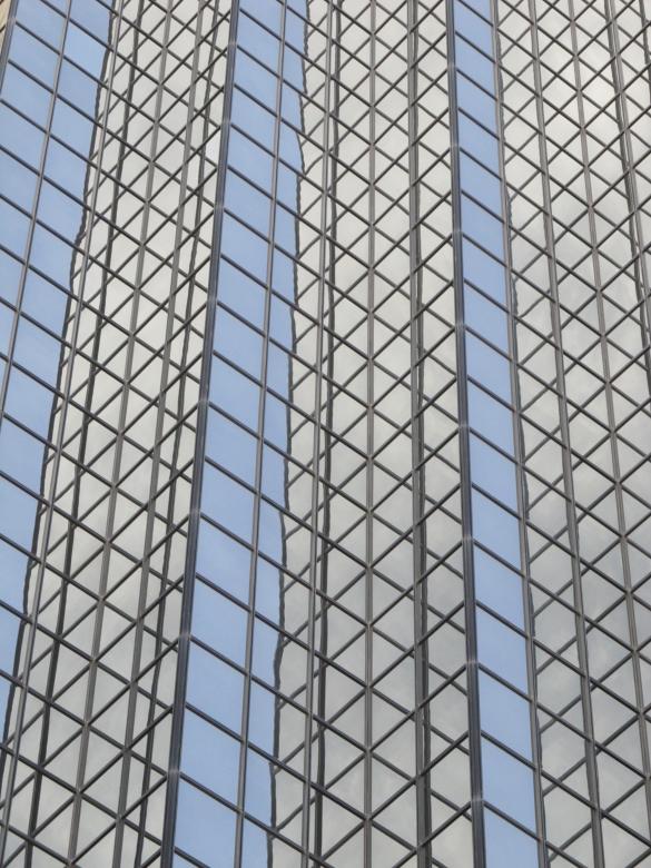 Free stock image of Glassy Building created by Pixabay
