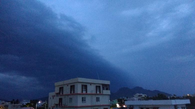 Free stock image of Hill like cloud over city created by k sangeeta