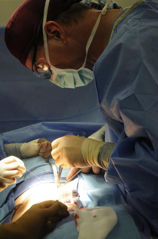Free stock image of Group of Surgeons Operating created by Pixabay