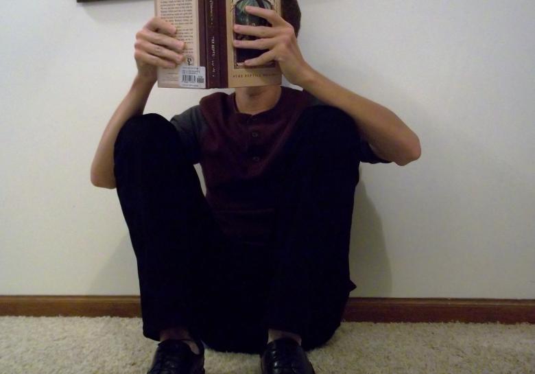 Free stock image of Sitting on floor reading created by Charles Roberts