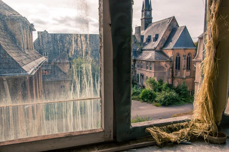 Free stock image of Town Through the Window created by Pixabay