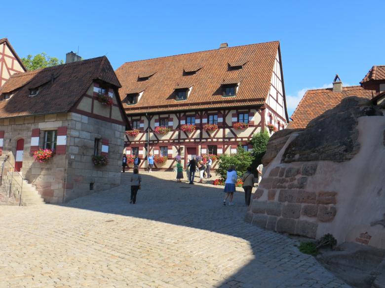 Free stock image of Old Castle Buildings and People created by Pixabay