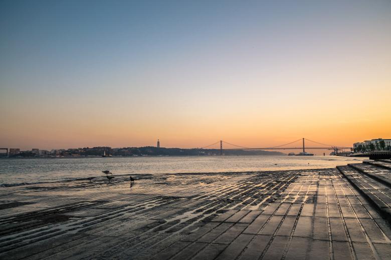 Free stock image of Lisbon river side at sunset created by invisiblepower