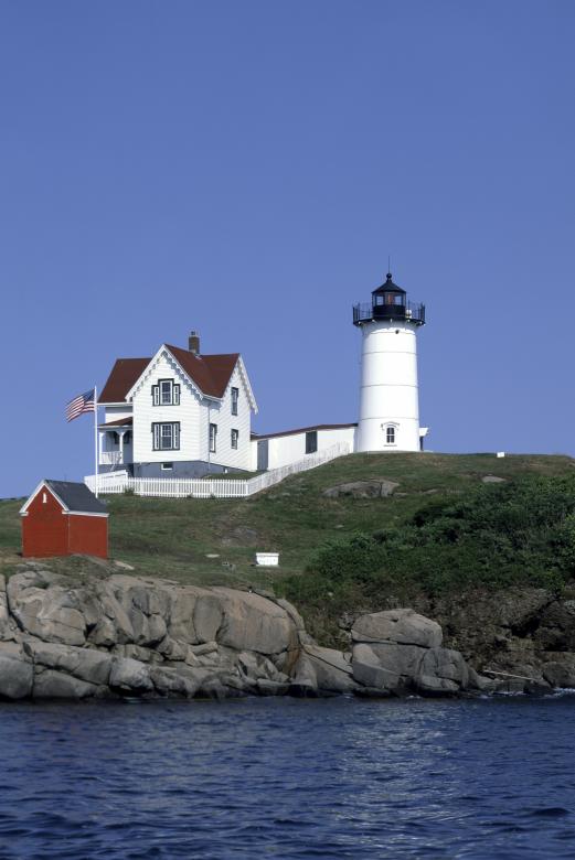 Free stock image of Lighthouse on the Seashore created by Pixabay
