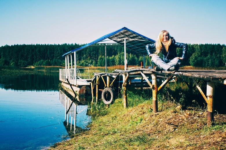 Free stock image of Woman on the Pier created by Pixabay